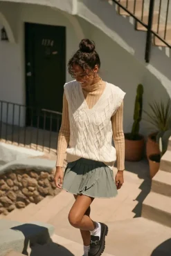Pleated Raw-Hem Mini Skirt